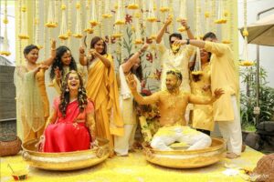 HOME 7 Bride covered in turmeric during haldi ceremony