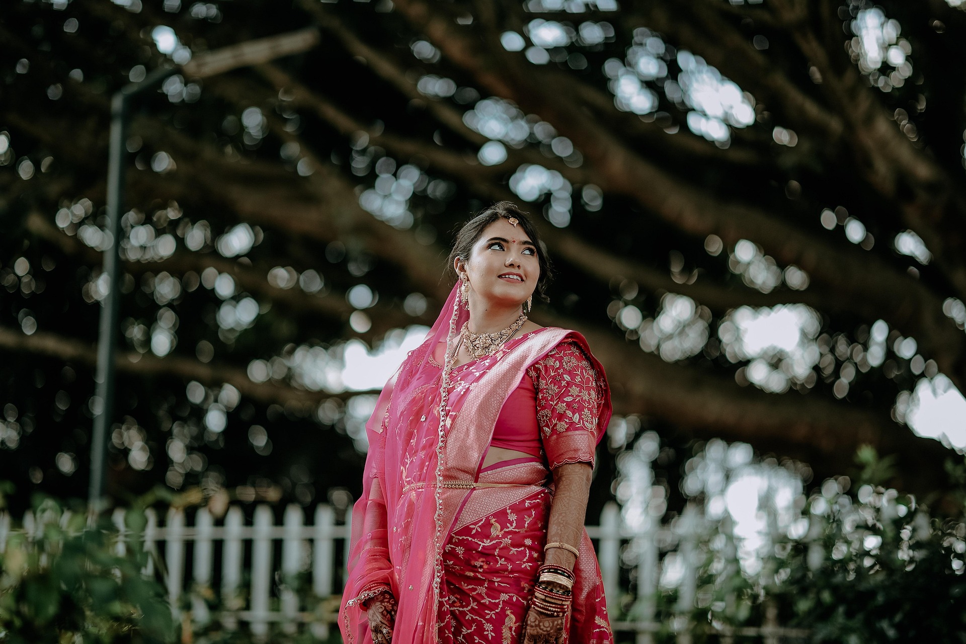 Groom applying sindoor during wedding ceremony