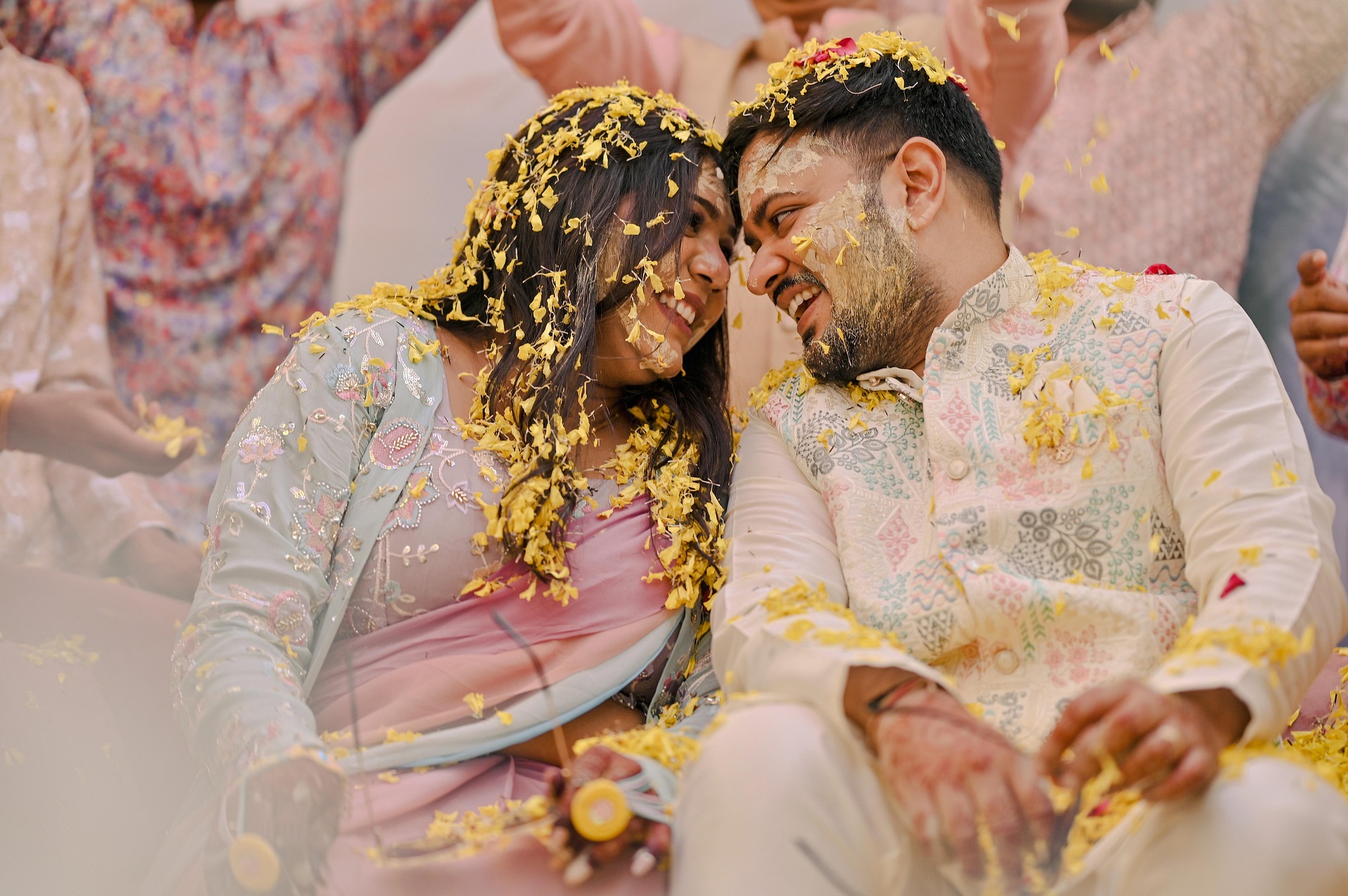 Bride and groom smiling after ring exchange