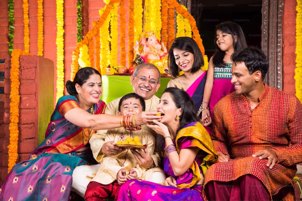 Best Wedding Photographer in Prayagraj – Capture Your Dream Wedding with SKumar Films 6 Bride and groom with family in traditional attire – formal wedding portrait