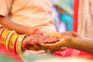 HOME 6 Bride walking down the aisle in traditional attire – emotional wedding moment